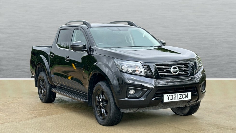 Compare Nissan Navara Nissan Special Edition Double Cab Pick Up N-guard YD21ZCM Black