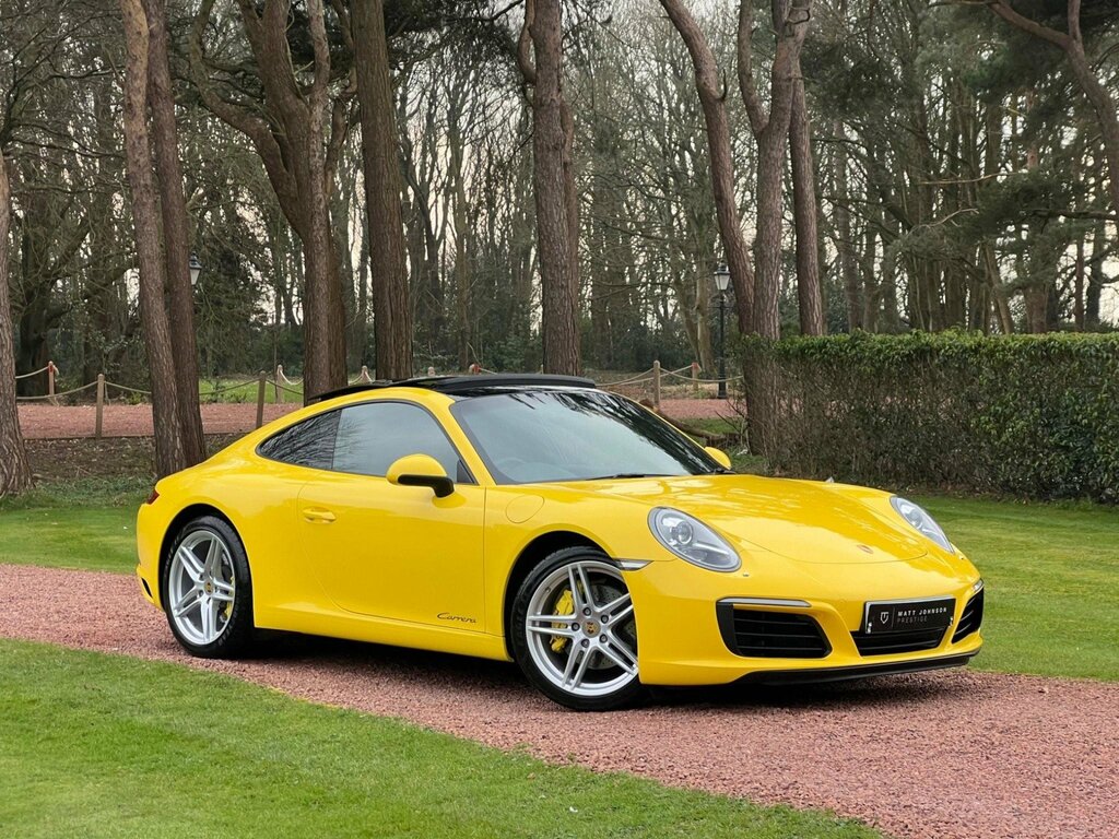 Compare Porsche 911 Carrera RX66ZRT Yellow
