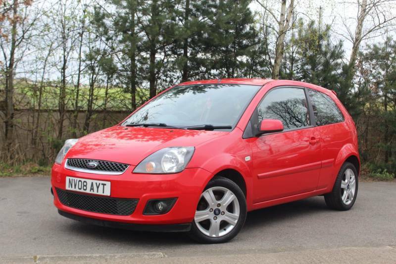 Compare Ford Fiesta 1.25 Zetec Climate NV08AYT Red