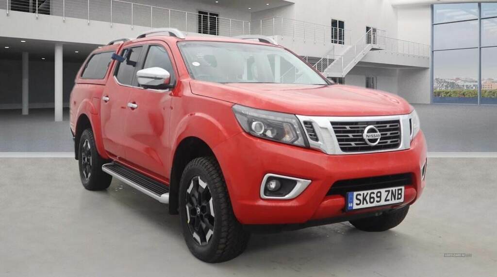 Compare Nissan Navara Double Cab Pick Up SK69ZNB Red