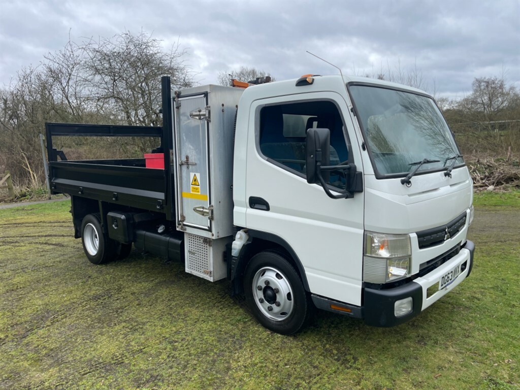 Compare Mitsubishi Fuso Canter 7C15 Toolbox Tipper One Council Owner DG63WVX White