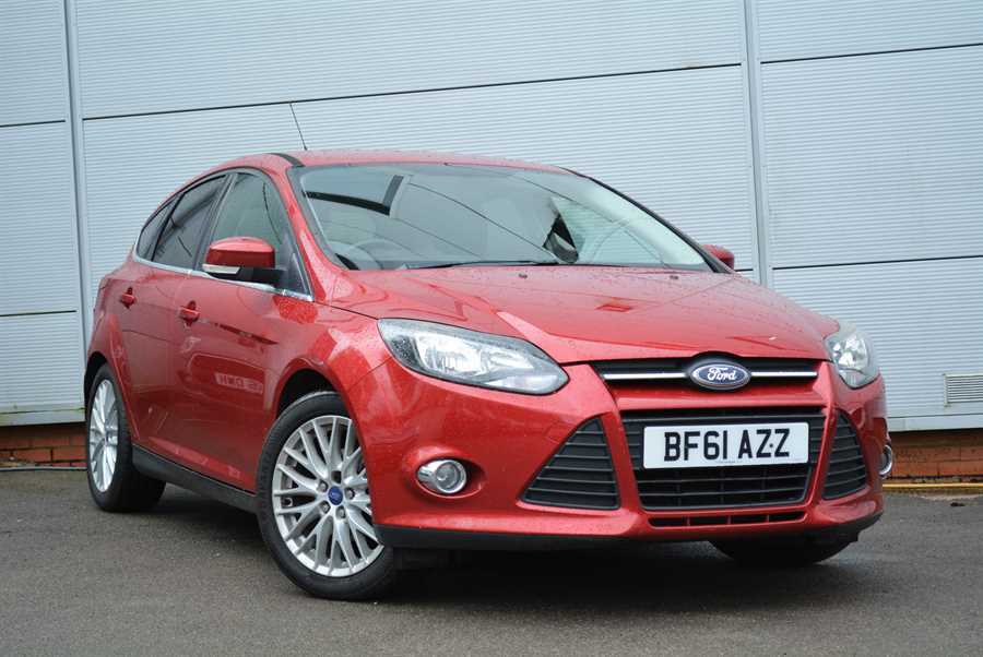 Compare Ford Focus Zetec Hatchback BF61AZZ Red