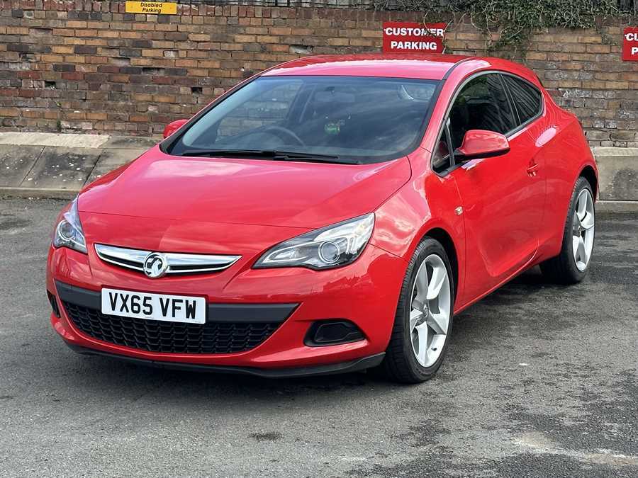 Compare Vauxhall Astra 16V Sport Coupe VX65VFW Red