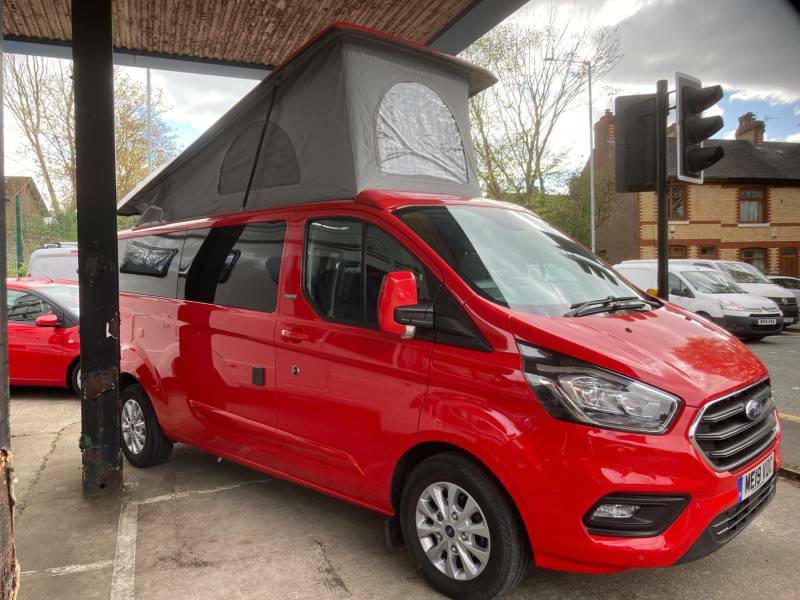 Compare Ford Transit Custom 2.0 Ecoblue 130Ps Low Roof Limited Van ME19VDC Red