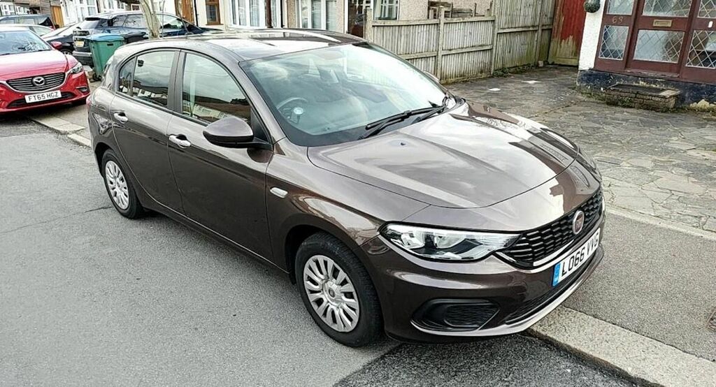 Compare Fiat Tipo Hatchback LO66VVG Brown