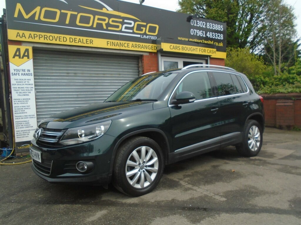Compare Volkswagen Tiguan 2.0 Tdi Bluemotion Tech Match 2Wd Euro 5 Ss GY63HVN Green