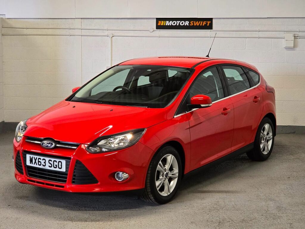 Compare Ford Focus Hatchback WX63SGO Red