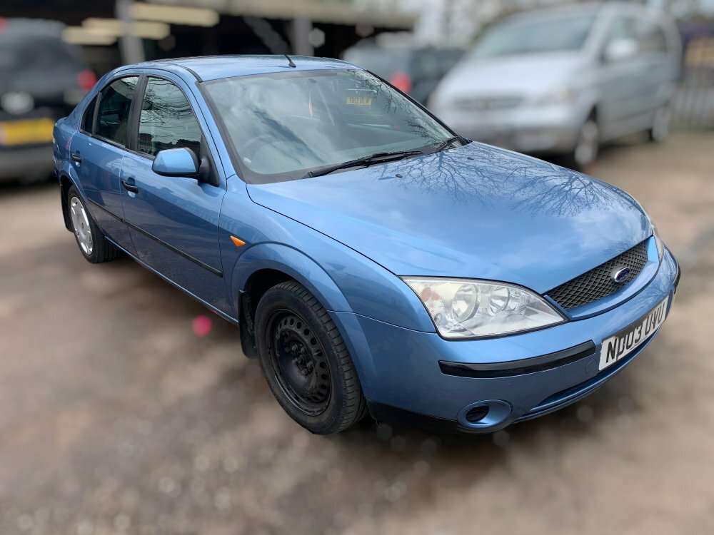 Compare Ford Mondeo LX 16V 5-Door ND03UVU Blue