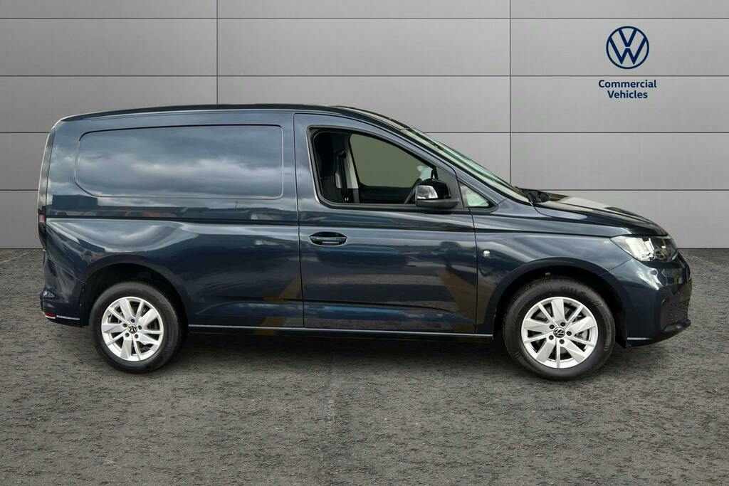 Compare Volkswagen Caddy 2.0 Tdi C20 Commerce Pro Panel Van Dsg FH23AXW Blue