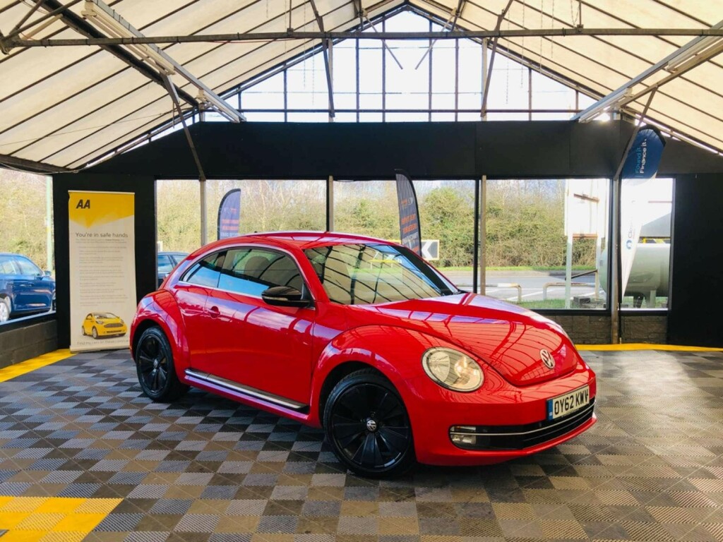 Compare Volkswagen Beetle Hatchback OY62KWV Red