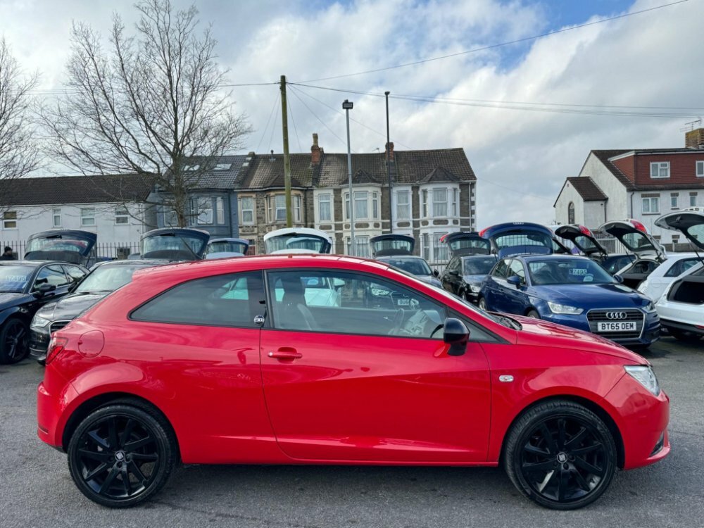 Compare Seat Ibiza 1.4 30 Years Sport Coupe Euro 5 FN64LHH Red