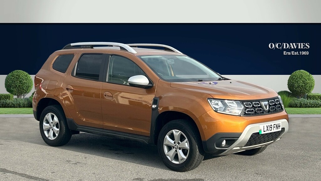 Compare Dacia Duster Comfort Sce LX19FNH Orange