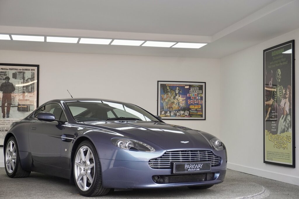 Compare Aston Martin Vantage Vantage V8 VX56BBZ Blue