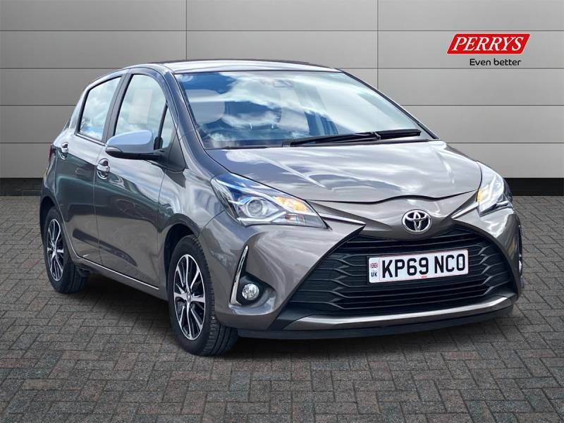 Compare Toyota Yaris Hatchback KP69NCO Brown