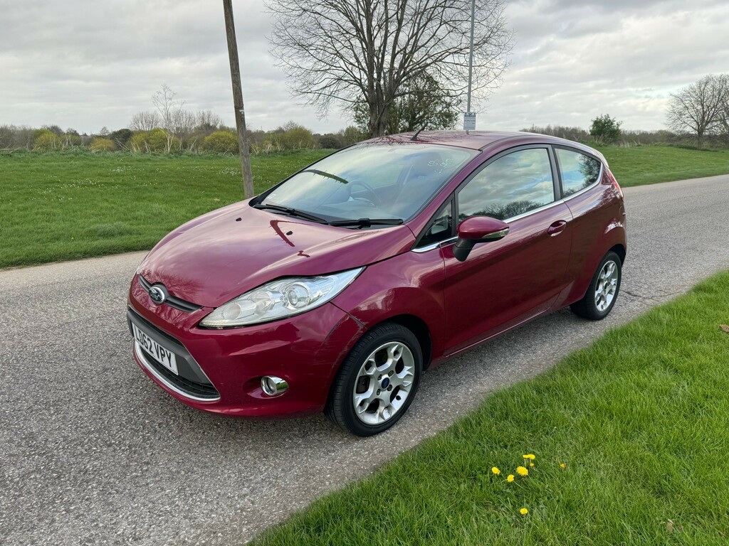 Compare Ford Fiesta Zetec LD62VPY Red