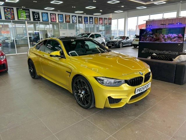 Compare BMW M4 M4 Competition DH18GWN Yellow