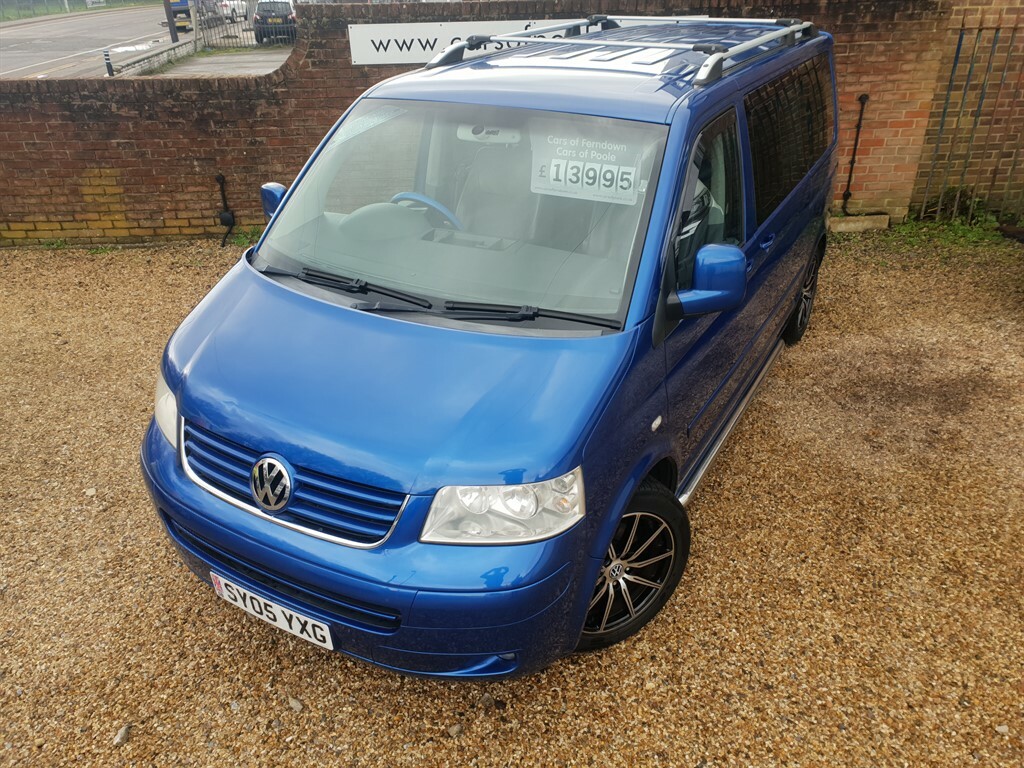 Compare Volkswagen Caravelle Executive Tdi SY05YXG Blue