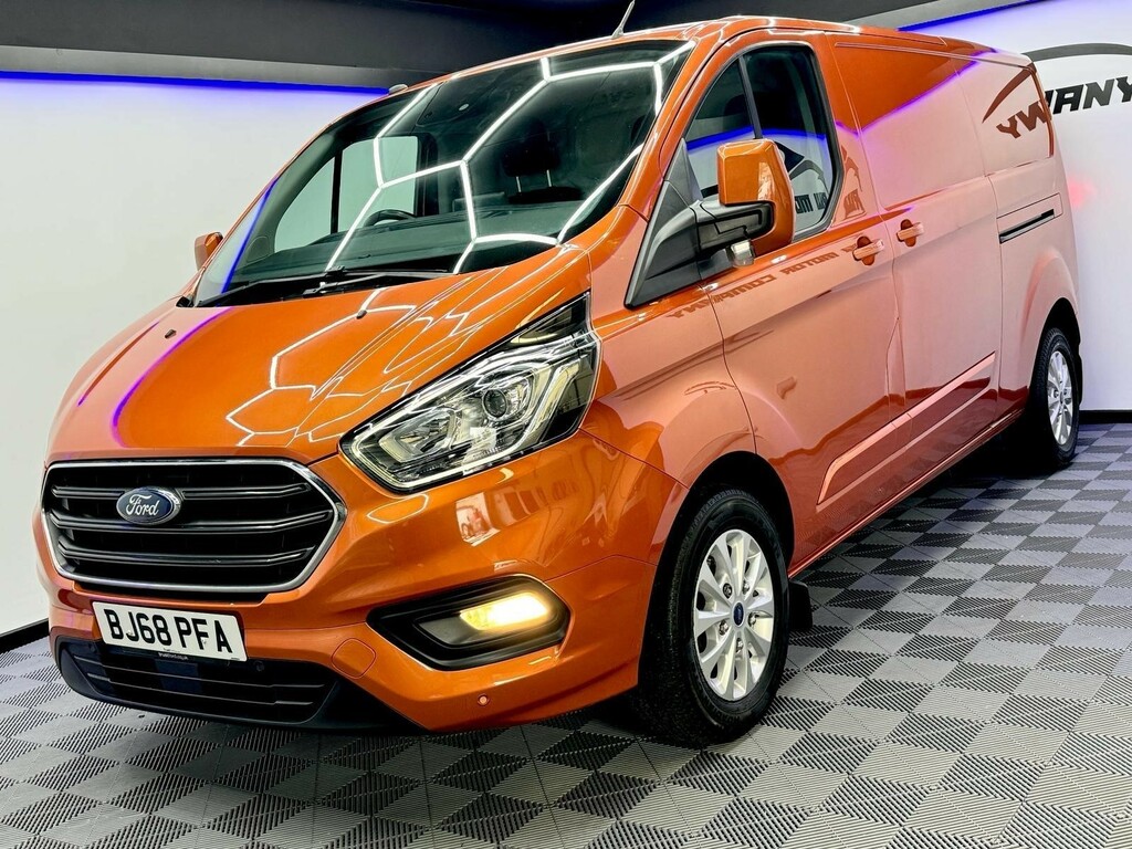 Compare Ford Transit Custom 2.0 300 Ecoblue Limited L2 H1 Euro 6 BJ68PFA Orange