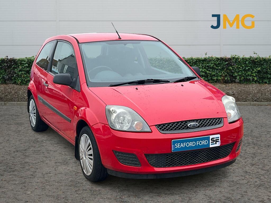Compare Ford Fiesta 1.4 Td Style Climate Hatchback  Red