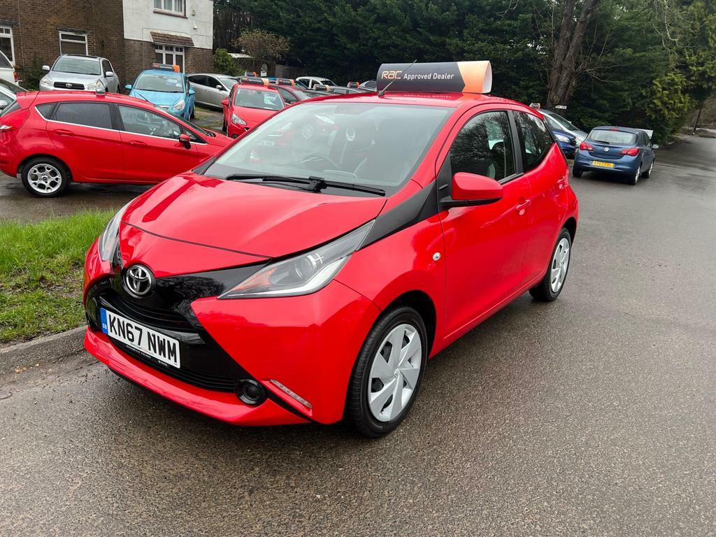 Compare Toyota Aygo 1.0 Vvt-i X-play Euro 6 KN67NWM Red