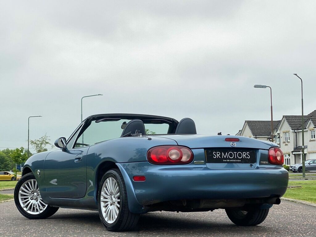 Compare Mazda MX-5 Convertible 1.8 Euphonic Limited Edition 2005 WU05YAH Blue