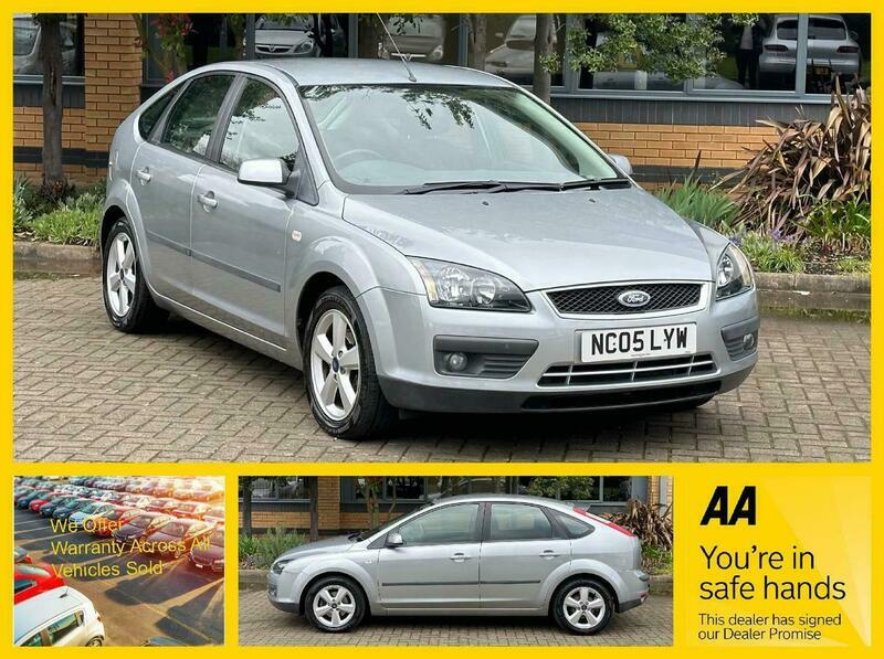 Compare Ford Focus 1.6 Zetec Climate NC05LYW Silver