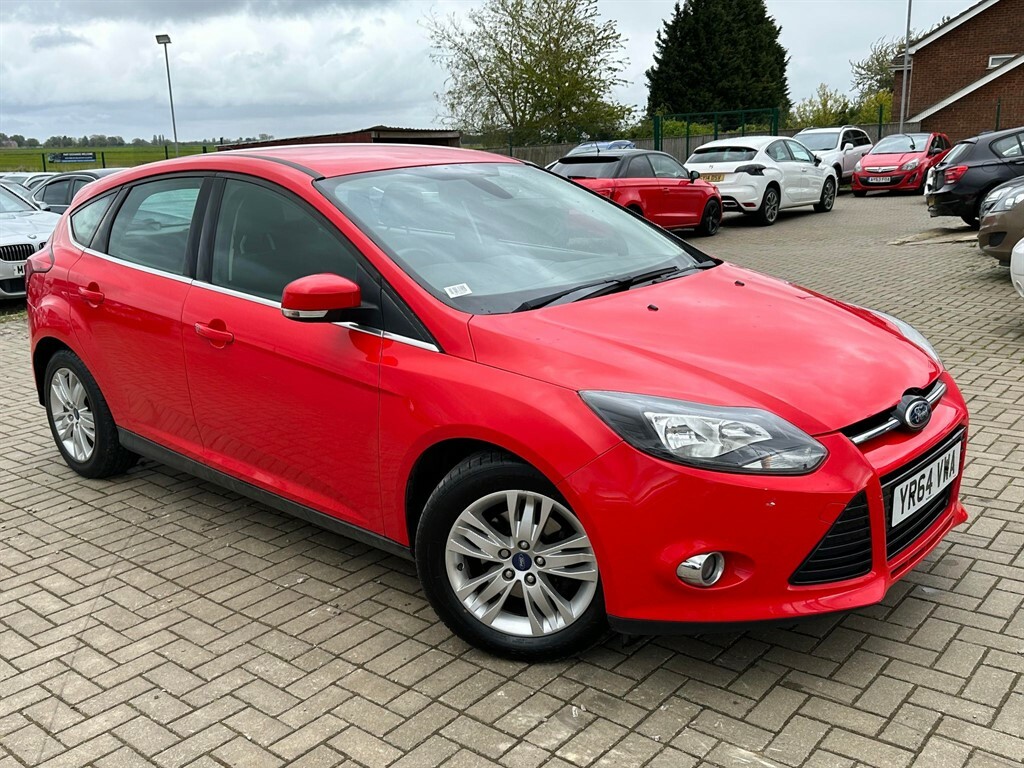 Compare Ford Focus Hatchback YR64VWA Red
