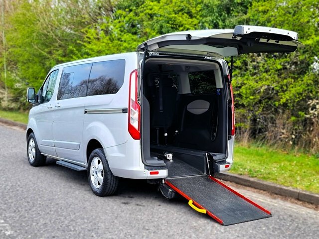 Compare Ford Tourneo Custom 5 Seat Wheelchair Accessible Vehicle With Access R SF67HZD Grey