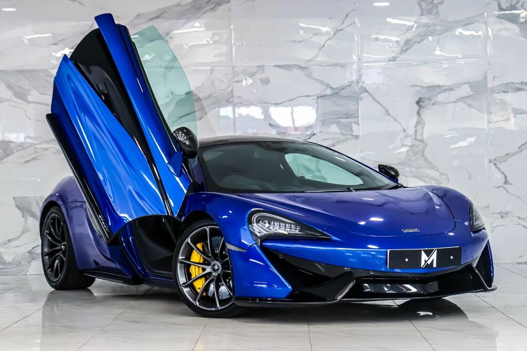 Compare McLaren 570GT 2020 3.8 V8 Ssg 562 Bhp M6FRM Blue