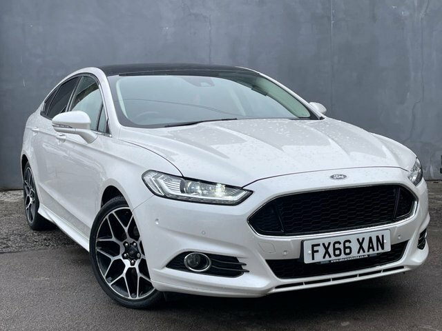 Compare Ford Mondeo Hatchback FX66XAN White
