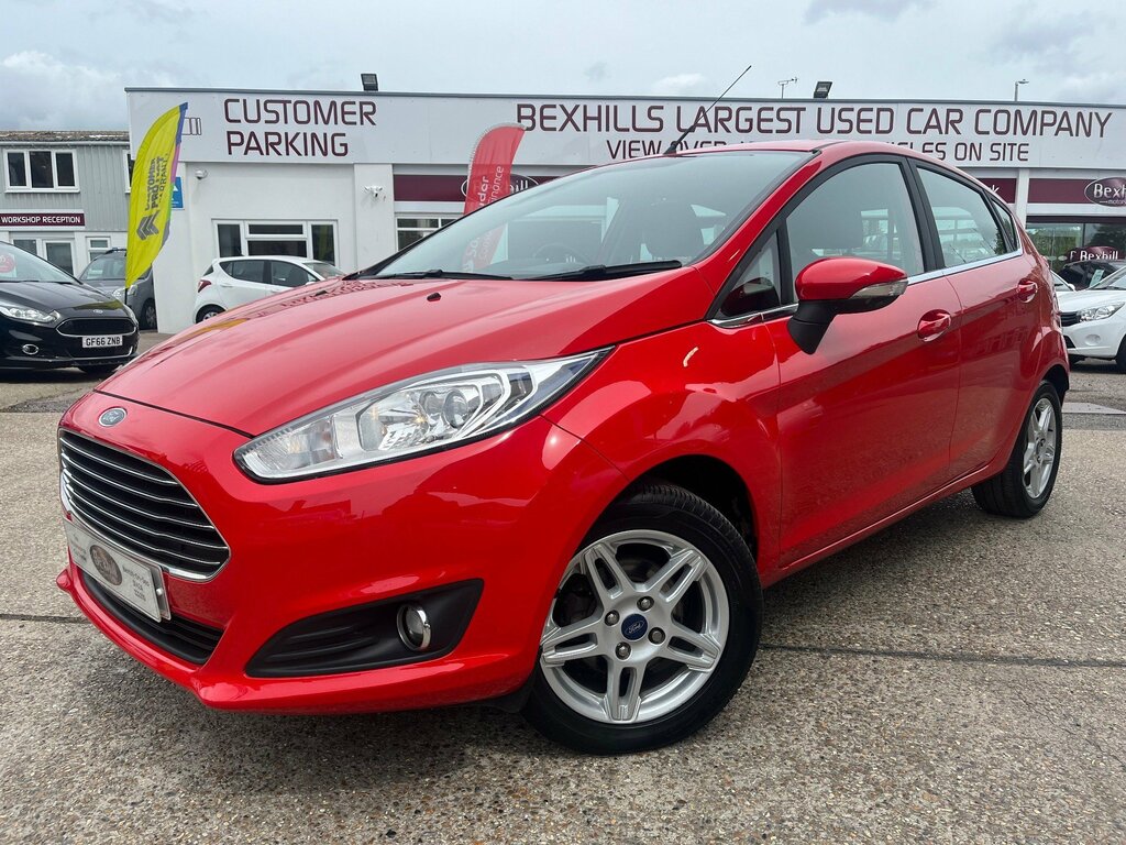 Compare Ford Fiesta Zetec YN63XND Red