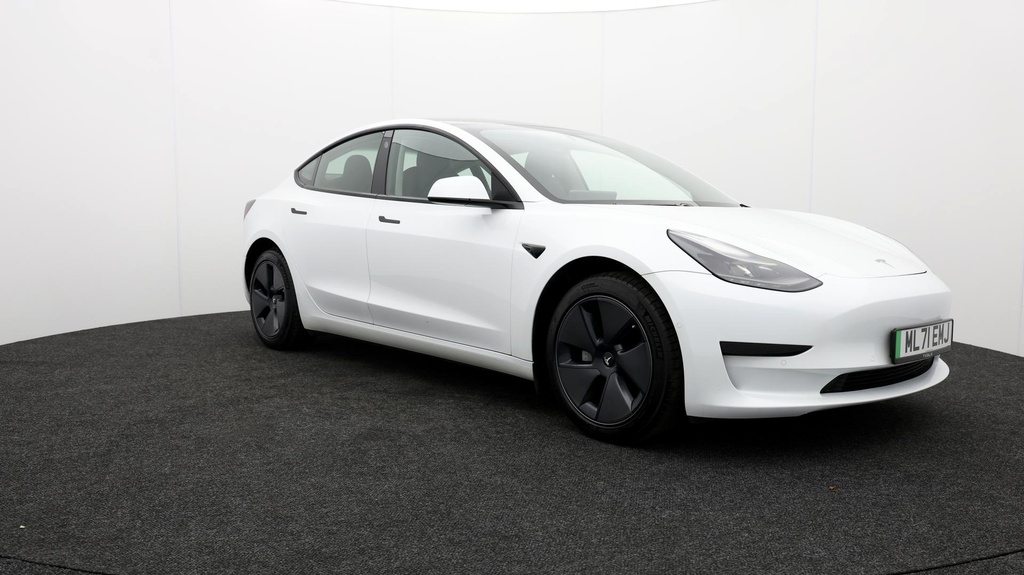 Compare Tesla Model 3 Standard Range Plus ML71EMJ White
