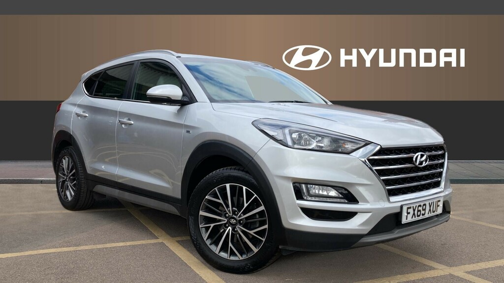Compare Hyundai Tucson Premium FX69XUF Silver