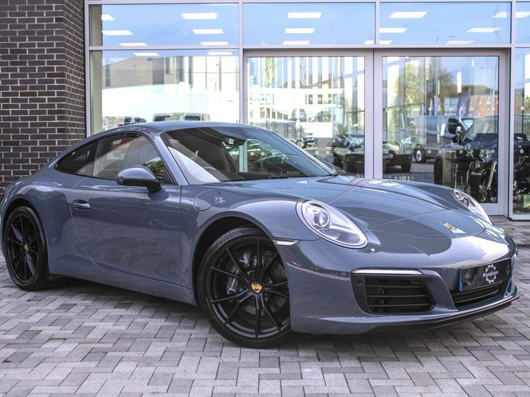 Compare Porsche 911 911 Carrera WA66WGF Blue