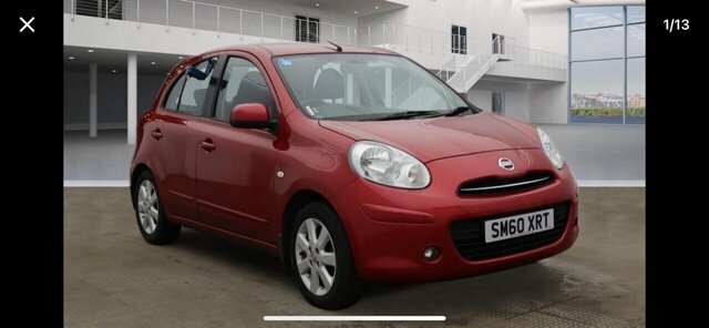 Compare Nissan Micra 1.2 Acenta 79 SM60XRT Red