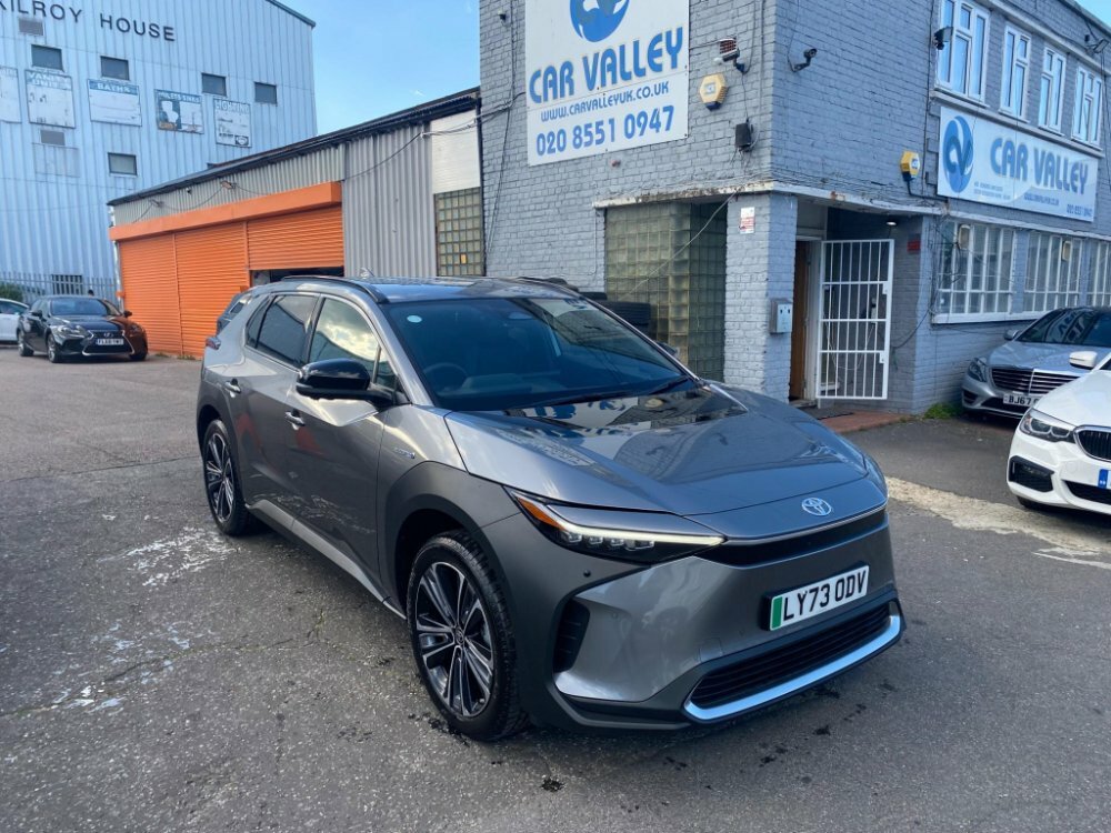 Compare Toyota bZ4X 71.4 Kwh Vision 11Kw Obc LY73ODV Grey