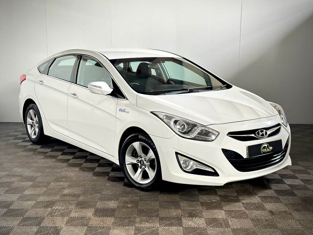 Compare Hyundai I40 Active EX64FUA White