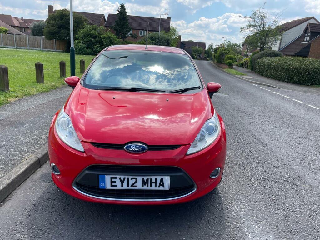 Compare Ford Fiesta Hatchback 1.3 Zetec 201212 EY12MHA Red
