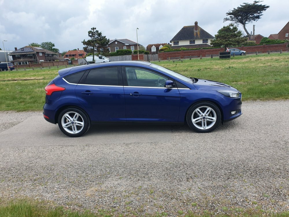 Compare Ford Focus Zetec Edition 5-Door Hundred Miles Only HG18HTP Blue