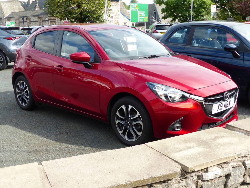 Compare Mazda 2 1.5 Sport Nav X9ABW Red