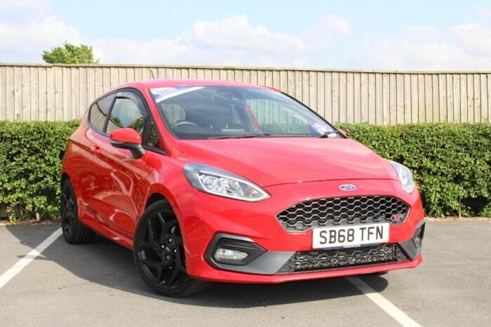 Compare Ford Fiesta St-3 SB68TFN Red