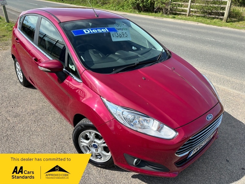 Compare Ford Fiesta 1.6 Tdci Zetec YR63EET Red