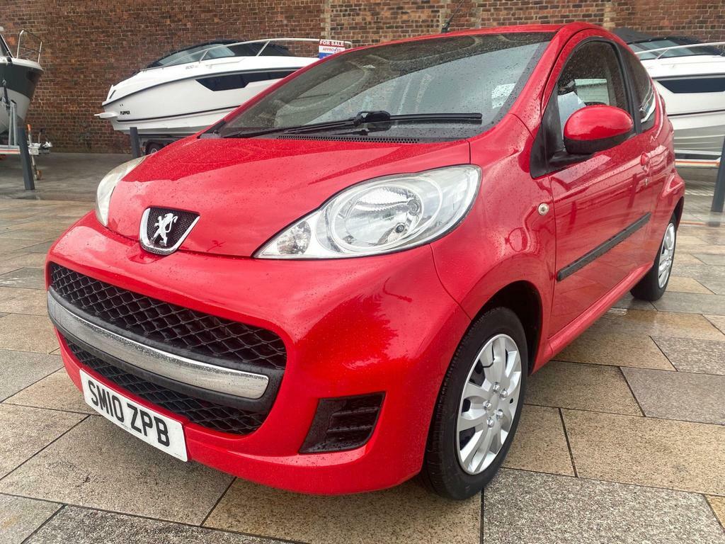 Compare Peugeot 107 Urban SM10ZPB Red