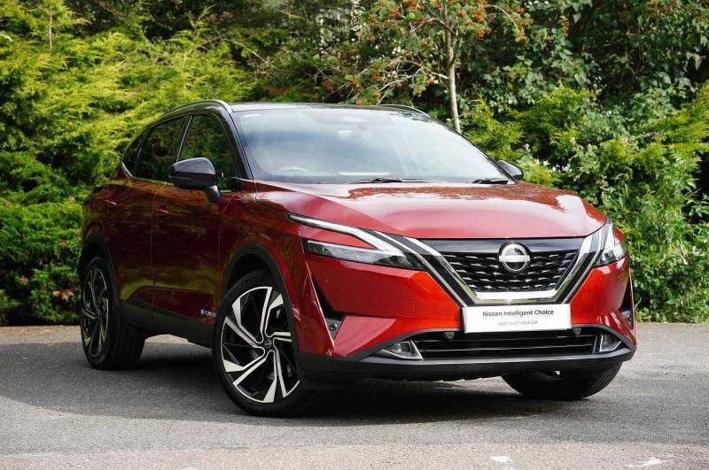 Compare Nissan Qashqai+2 Hatchback OE23YZG Red