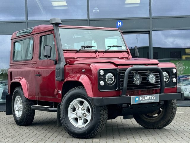Compare Land Rover Defender 90 90 Td5 County Station CE03SWX Red