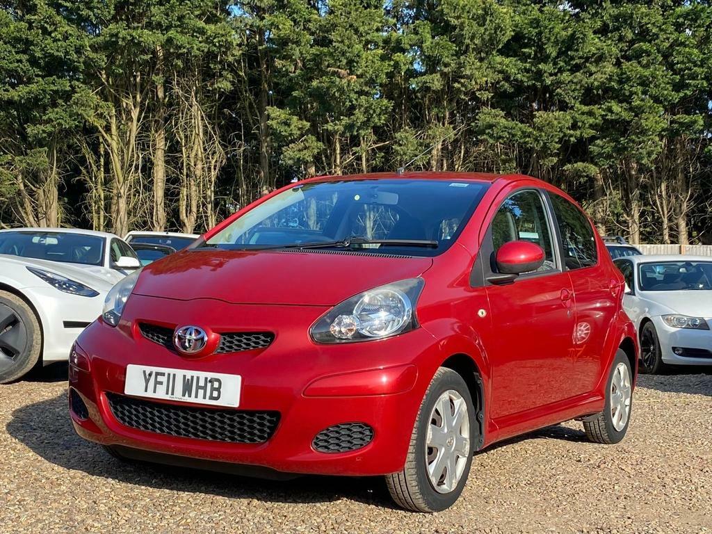 Compare Toyota Aygo 1.0 Vvt-i Ice Multimode Euro 5 YF11WHB Red
