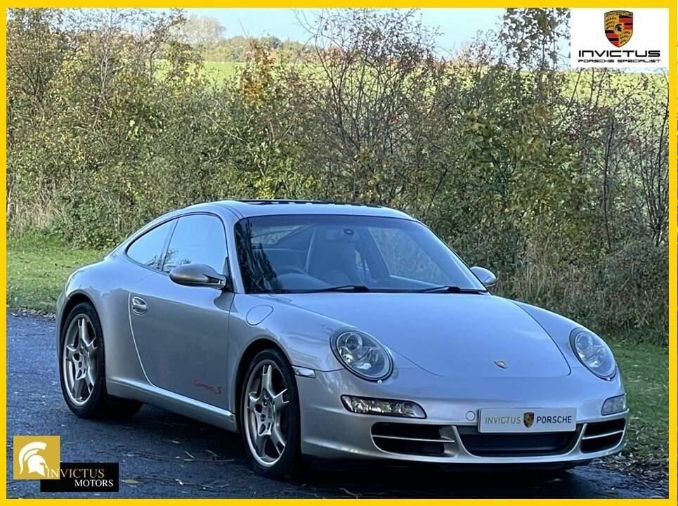 Compare Porsche 911 Coupe EY55UMT Silver