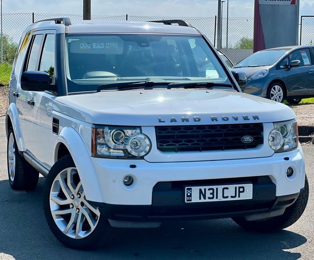 Compare Land Rover Discovery Estate HY11YUT White