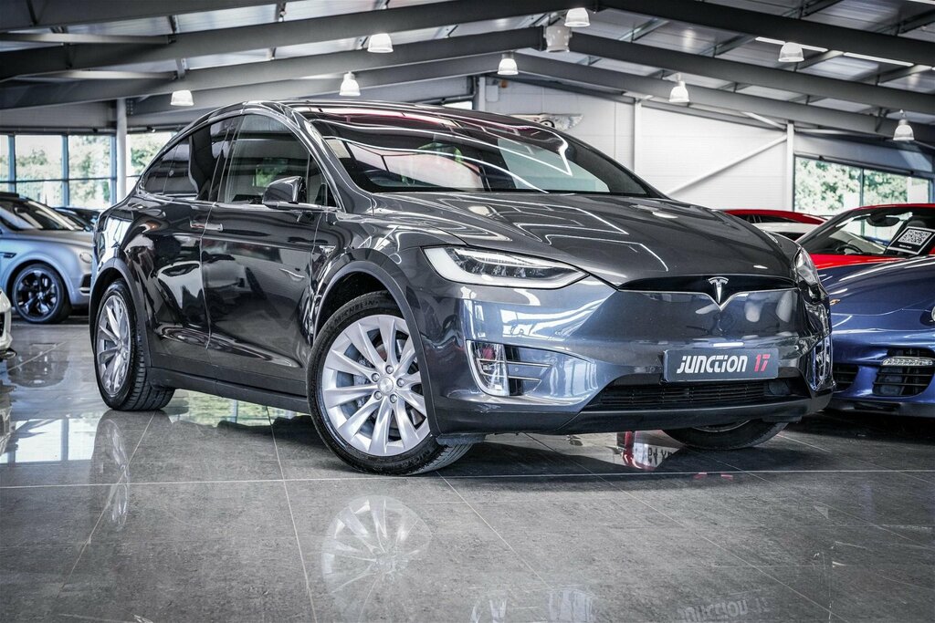 Compare Tesla Model X 100D Dual Motor 4Wde BL18ZVS 