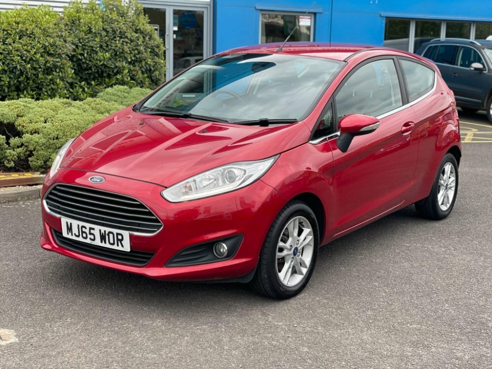 Compare Ford Fiesta Zetec MJ65WOR Red